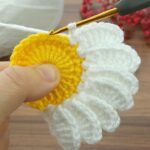 Easy Crochet Daisy Motif Pattern - Create charming daisy motifs with ease using this simple crochet pattern