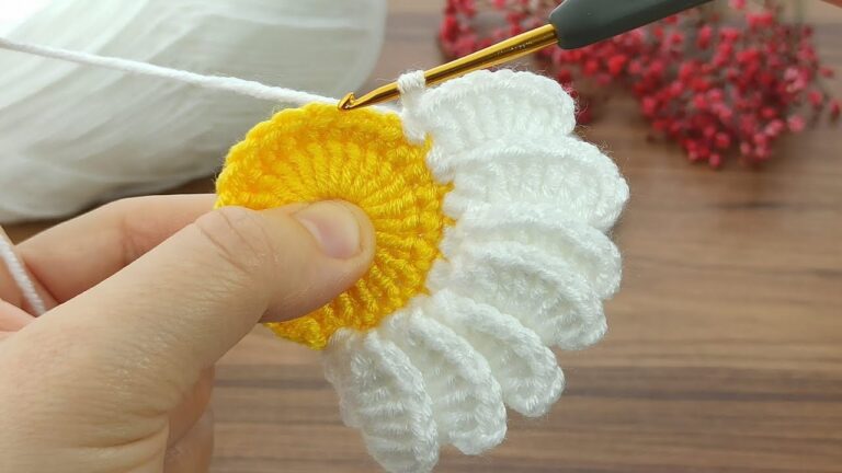 Easy Crochet Daisy Motif Pattern - Create charming daisy motifs with ease using this simple crochet pattern