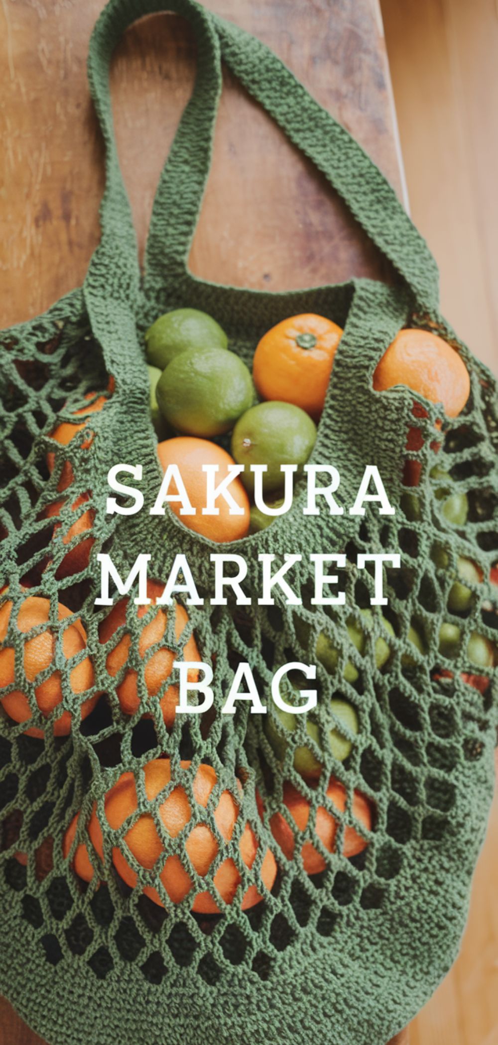 Close-up of a green crochet Sakura market bag featuring a detailed floral design, crafted with chain stitches, double crochets, and picot stitches.