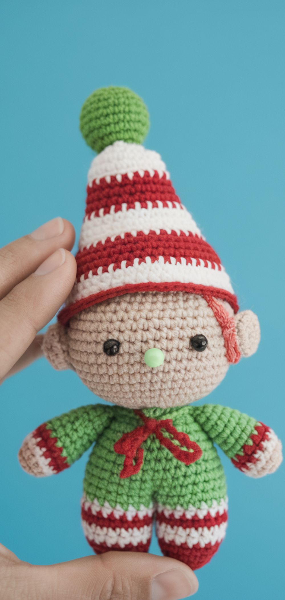 A cute crochet Elf Amigurumi ornament, perfect for adding holiday cheer to your Christmas tree.